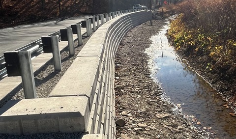 View of a completed retaining wall along Baileys Run Road in East Deer